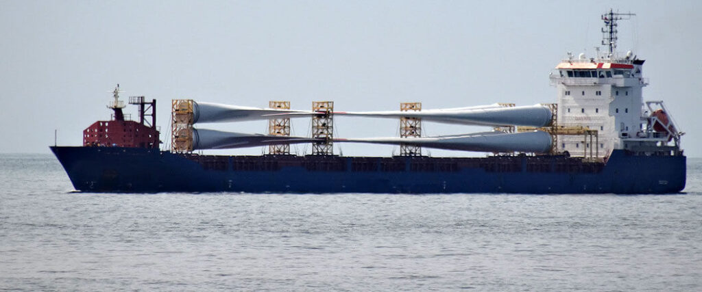 A cargo ship transporting airplane wings in this photo is one answer to what is break bulk shipping