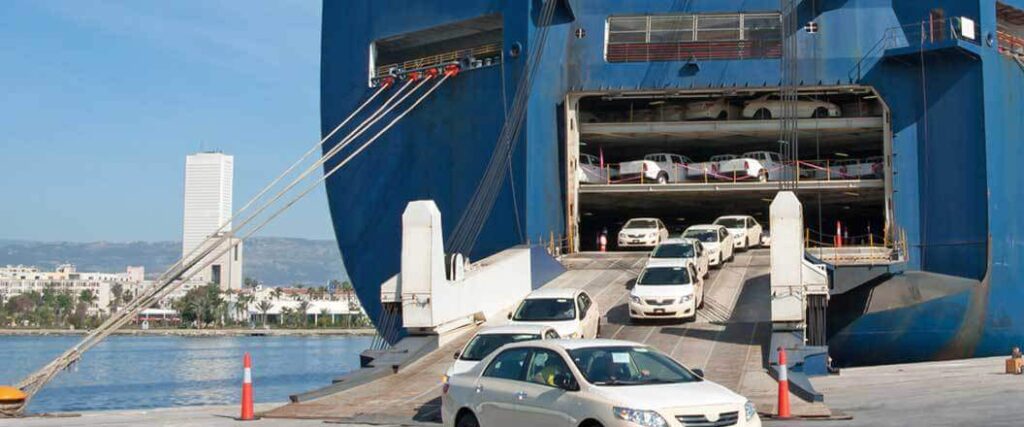 An RO/RO vessel being unloaded of cars